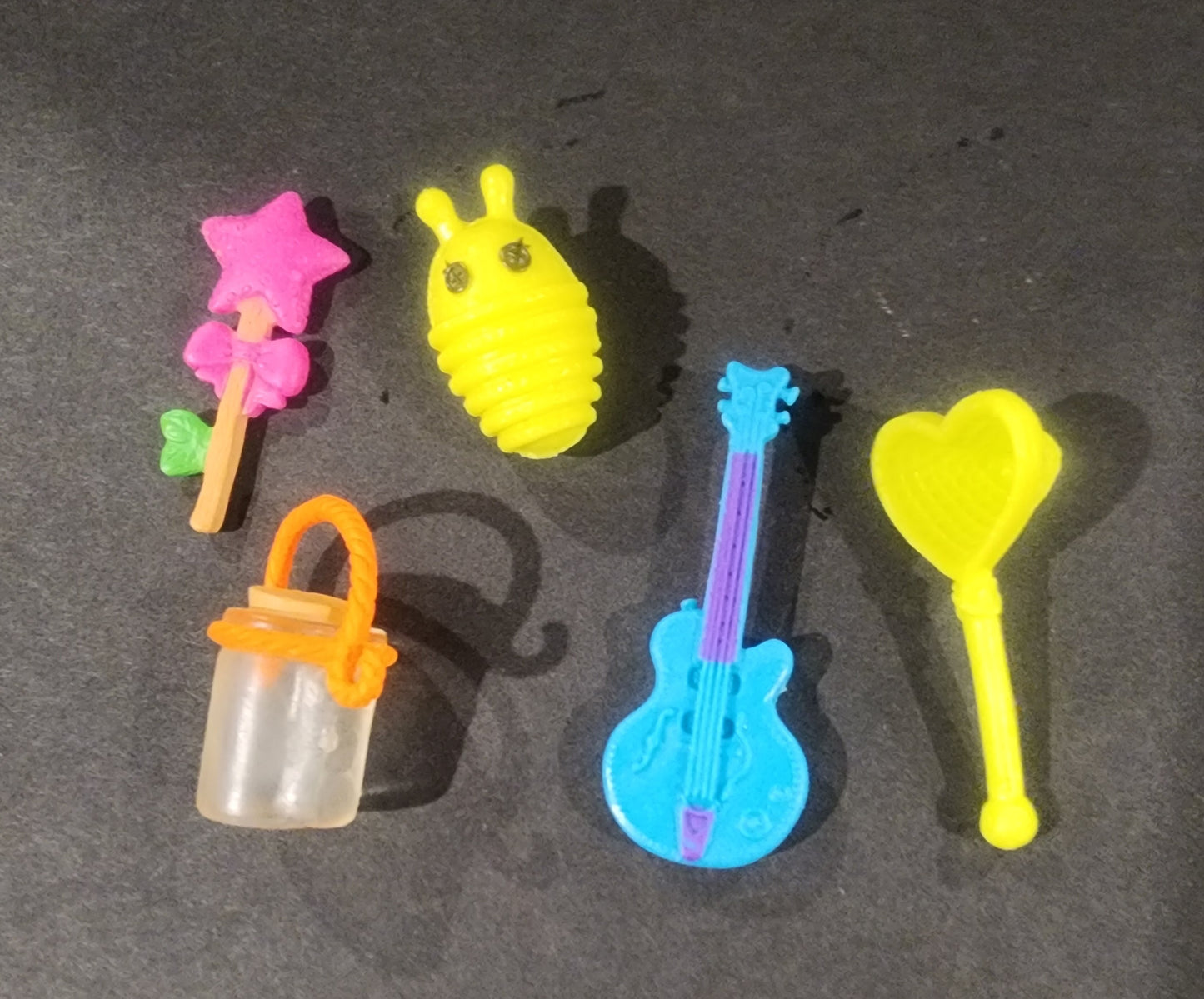 Lalaloopsy mini doll Pix E. Flutters comes with her adorable little bee and accessories 6 piece set