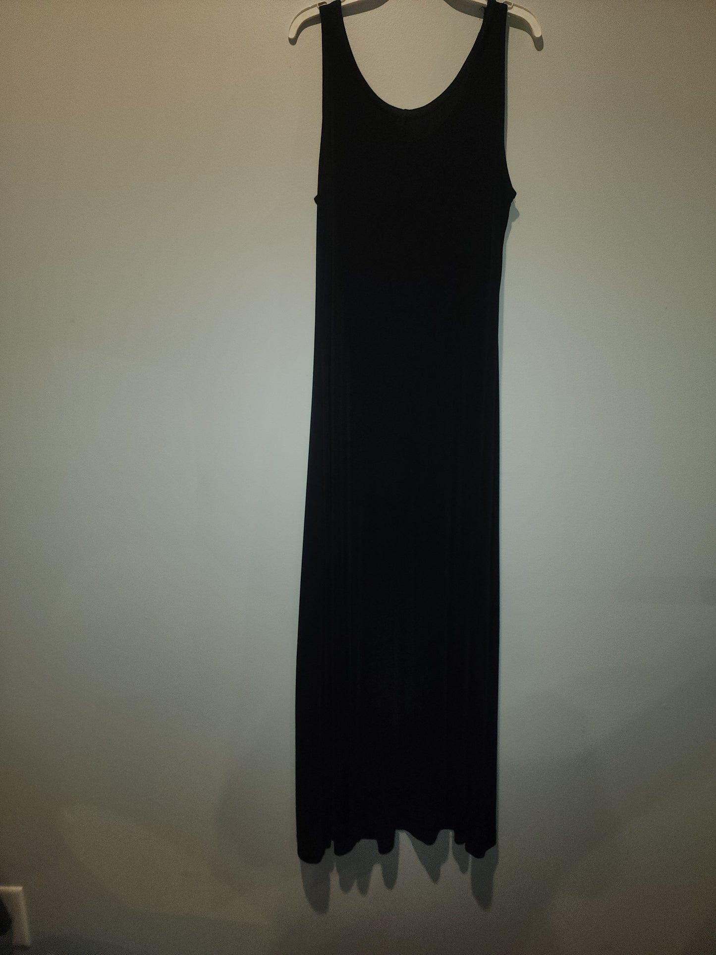 Black maxi dress paired with a short-sleeved top featuring a Giraffe Pattern M