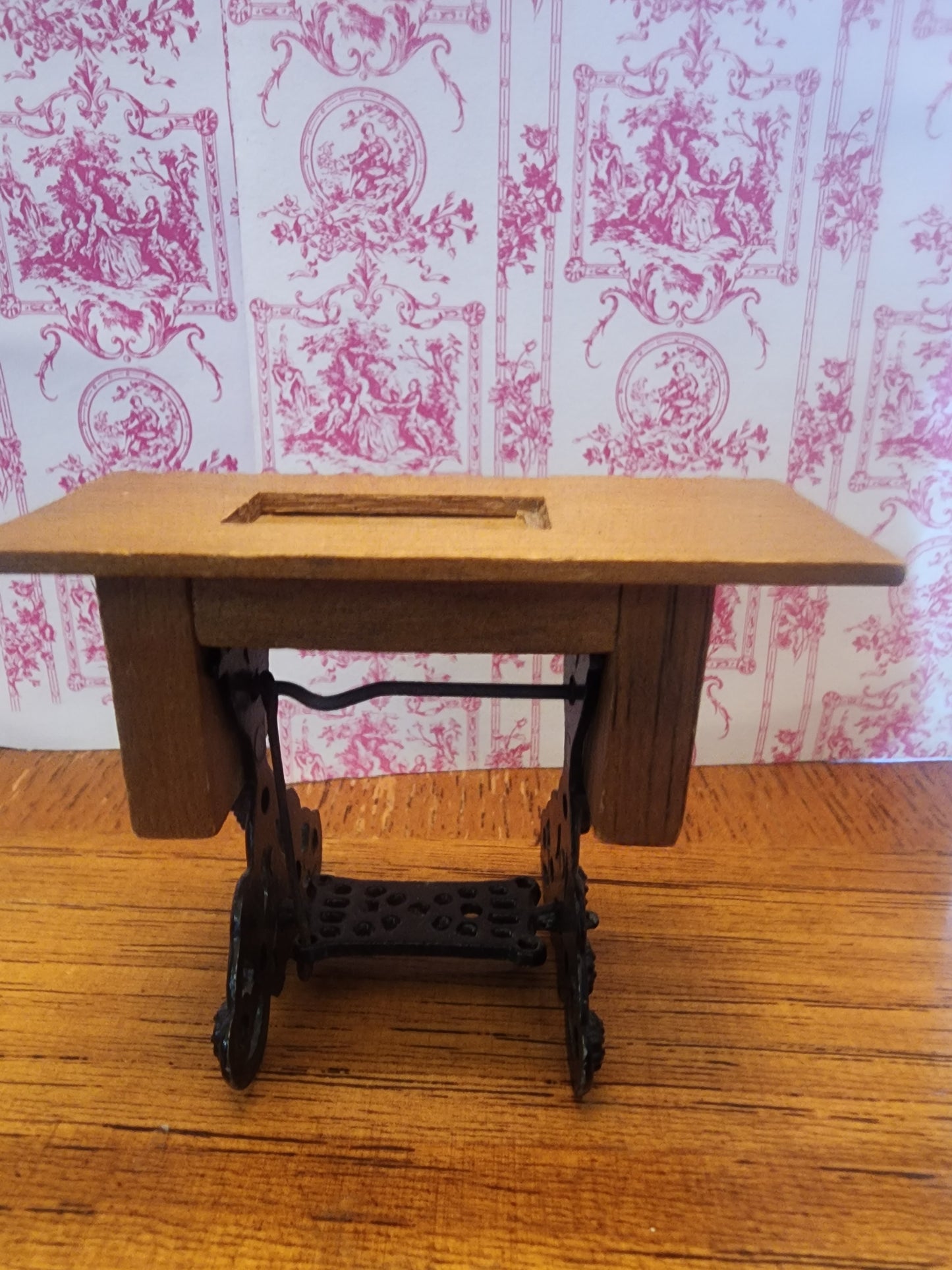 Vintage miniature sewing machine cabinet for dollhouse