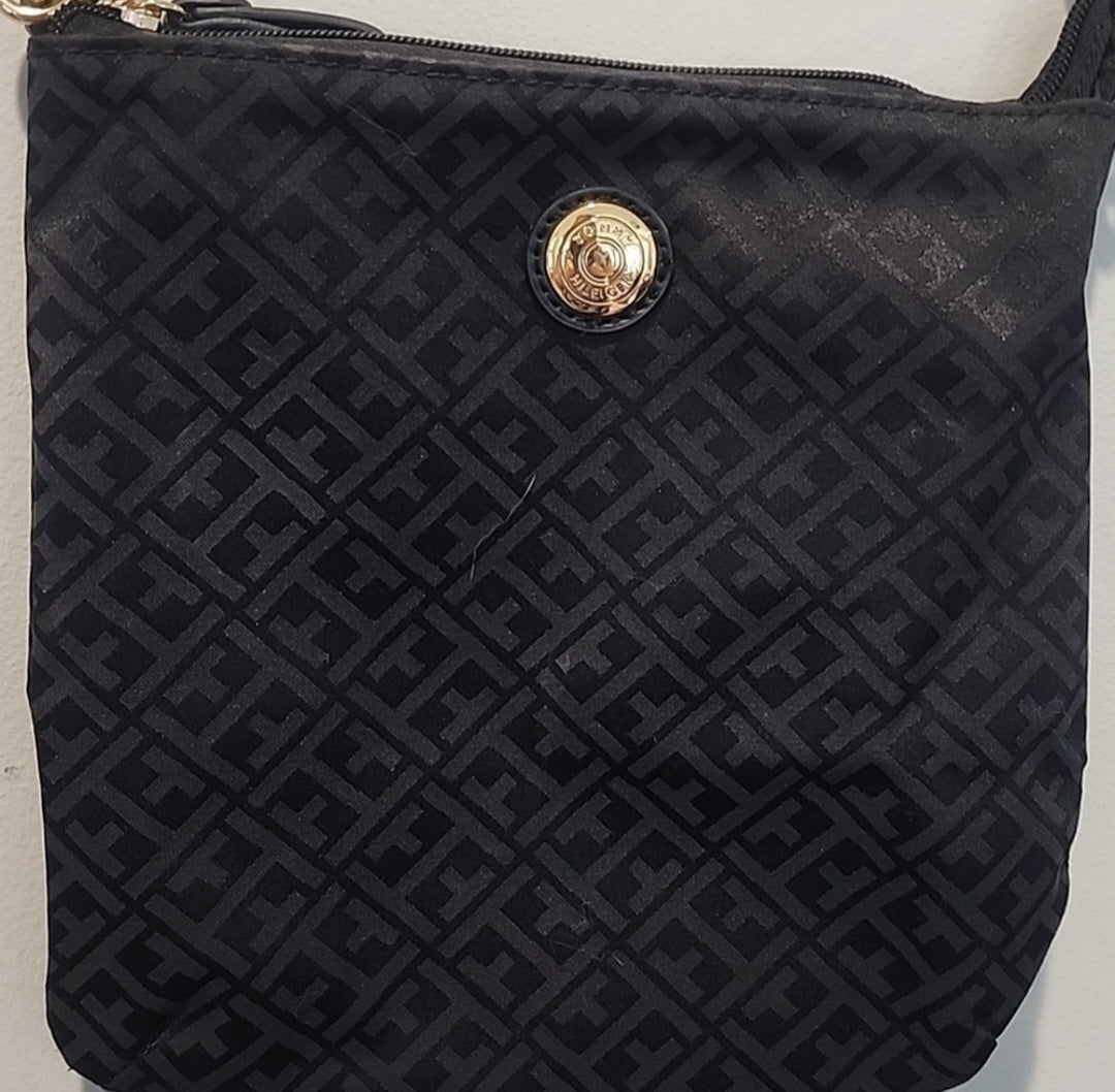 Tommy Hilfiger  black crossbody bag is perfect for any occasion.